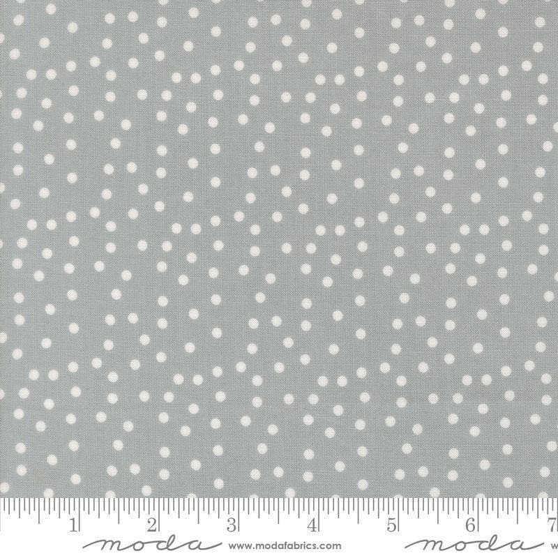 Image of Makers Delight Small Dot Platinum by Chrissy Lux for Moda Fabrics. Features polka dots on a gray background. Cute Little Fabric Shop.