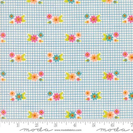 Image of Makers Delight Tiny Floral Breeze by Chrissy Lux for Moda Fabrics. Features flowers on a blue and white background. Cute Little Fabric Shop.
