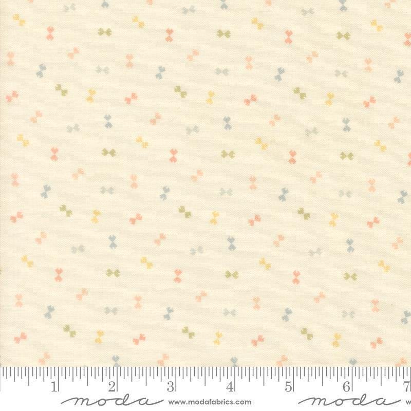 Image of Handmade Sweetness Confetti Porcelain quilting cotton fabric by My Sew Quilty Life for Moda Fabrics. Features bows on a cream background. Cute Little Fabric Shop.