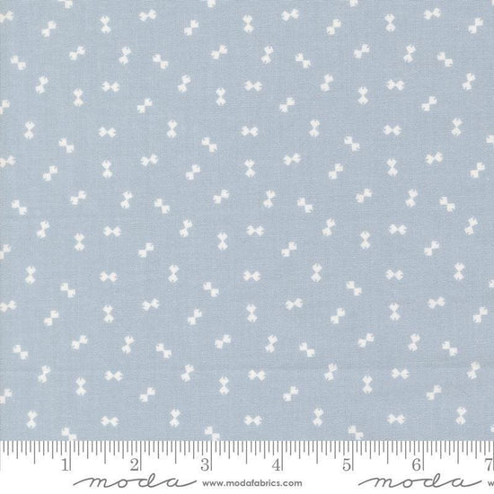 Image of Handmade Sweetness Confetti Powder Blue quilting cotton fabric by My Sew Quilty Life for Moda Fabrics. Features bows on a blue background. Cute Little Fabric Shop.