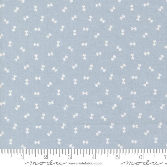 Image of Handmade Sweetness Confetti Powder Blue quilting cotton fabric by My Sew Quilty Life for Moda Fabrics. Features bows on a blue background. Cute Little Fabric Shop.