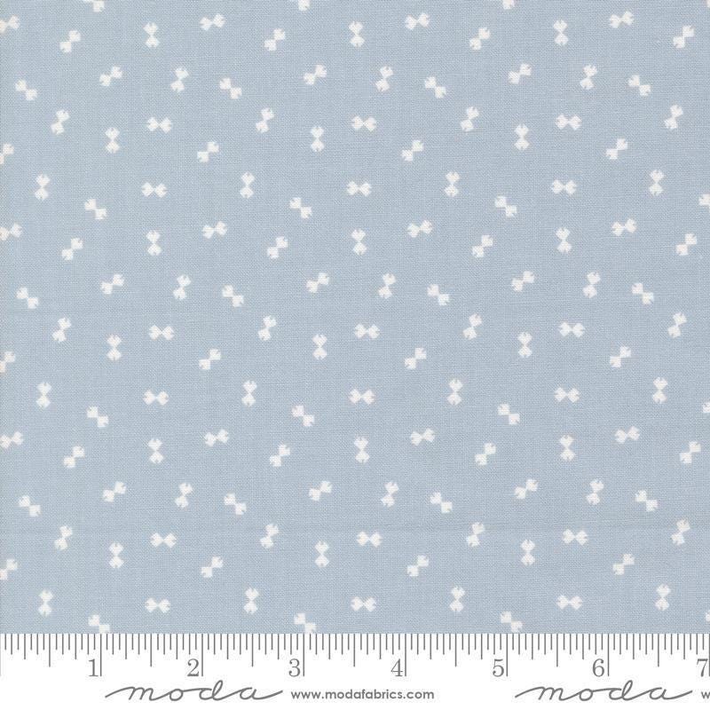 Image of Handmade Sweetness Confetti Powder Blue quilting cotton fabric by My Sew Quilty Life for Moda Fabrics. Features bows on a blue background. Cute Little Fabric Shop.