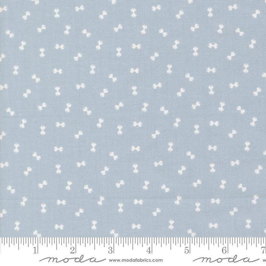 Image of Handmade Sweetness Confetti Powder Blue quilting cotton fabric by My Sew Quilty Life for Moda Fabrics. Features bows on a blue background. Cute Little Fabric Shop.