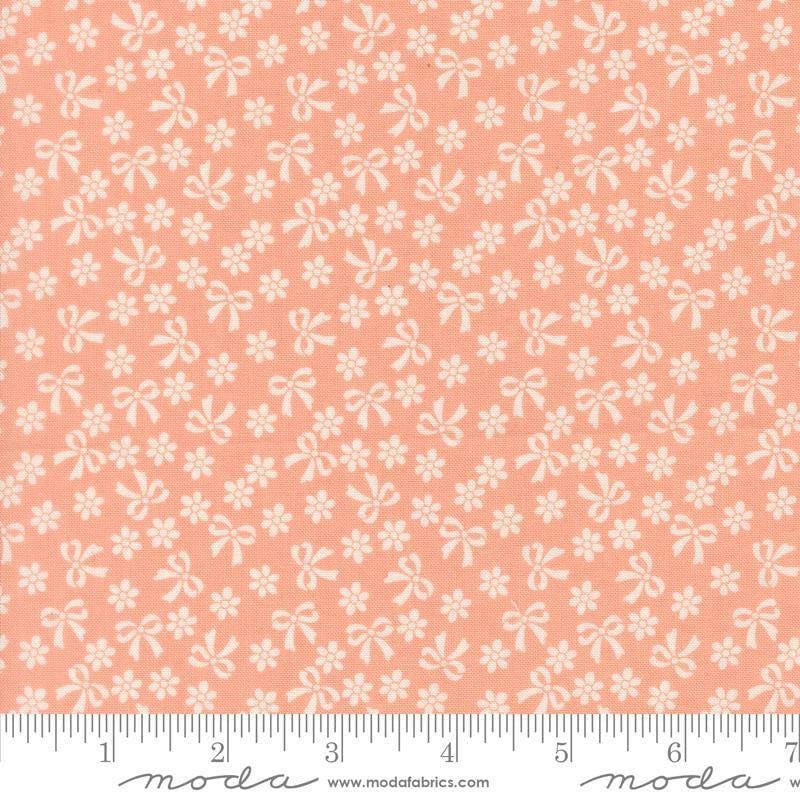 Image of Handmade Sweetness Bows Peach Pink quilting cotton fabric by My Sew Quilty Life for Moda Fabrics. Features flowers on a cream background. Cute Little Fabric Shop.