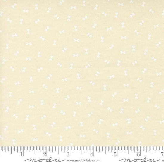 Image of Handmade Sweetness Confetti Porcelain White quilting cotton fabric by My Sew Quilty Life for Moda Fabrics. Features bows on a cream background. Cute Little Fabric Shop.