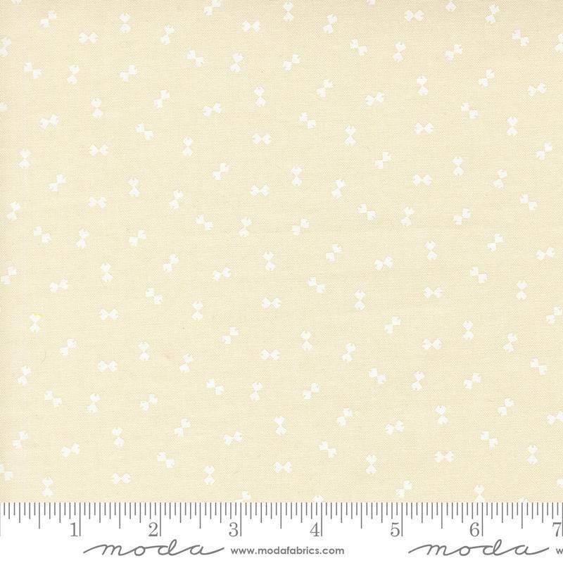 Image of Handmade Sweetness Confetti Porcelain White quilting cotton fabric by My Sew Quilty Life for Moda Fabrics. Features bows on a cream background. Cute Little Fabric Shop.