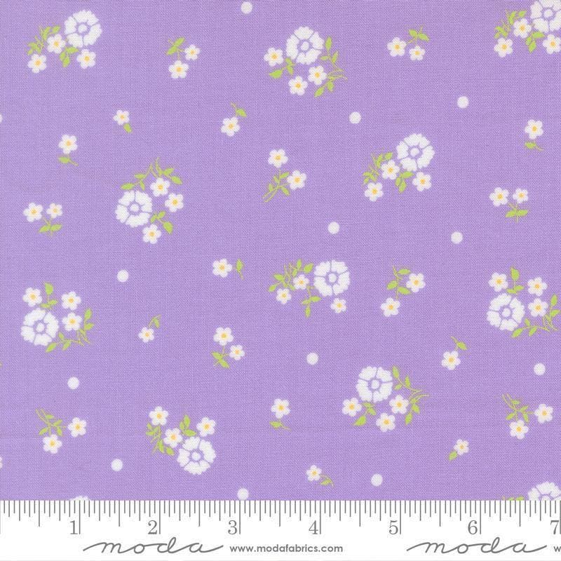 Image of Joysome Hand Picked Lavender quilting cotton fabric by Corey Yoder for Moda Fabrics. Features flowers on a purple background. Cute Little Fabric Shop.