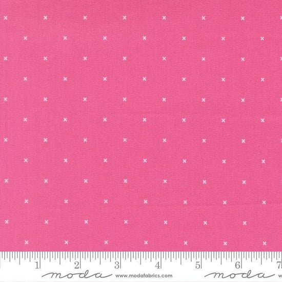 Image of Joysome Tiny Peel Petunia quilting cotton fabric by Corey Yoder for Moda Fabrics. Features tiny xs on a pink background. Cute Little Fabric Shop.