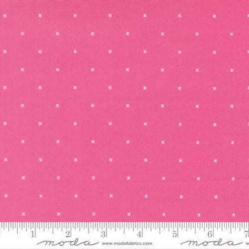 Image of Joysome Tiny Peel Petunia quilting cotton fabric by Corey Yoder for Moda Fabrics. Features tiny xs on a pink background. Cute Little Fabric Shop.