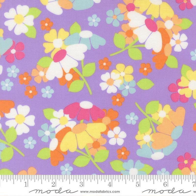 Image of Joysome Flower Fields Lavender quilting cotton fabric by Corey Yoder for Moda Fabrics. Features flowers on a purple background. Cute Little Fabric Shop.