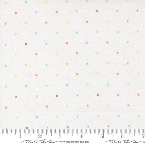 Image of Joysome Tiny Peel Cloud quilting cotton fabric by Corey Yoder for Moda Fabrics. Features tiny xs on a white background. Cute Little Fabric Shop.