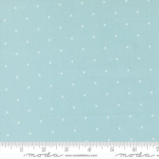 Image of Joysome Tiny Peel Sky quilting cotton fabric by Corey Yoder for Moda Fabrics. Features tiny xs on a blue background. Cute Little Fabric Shop.