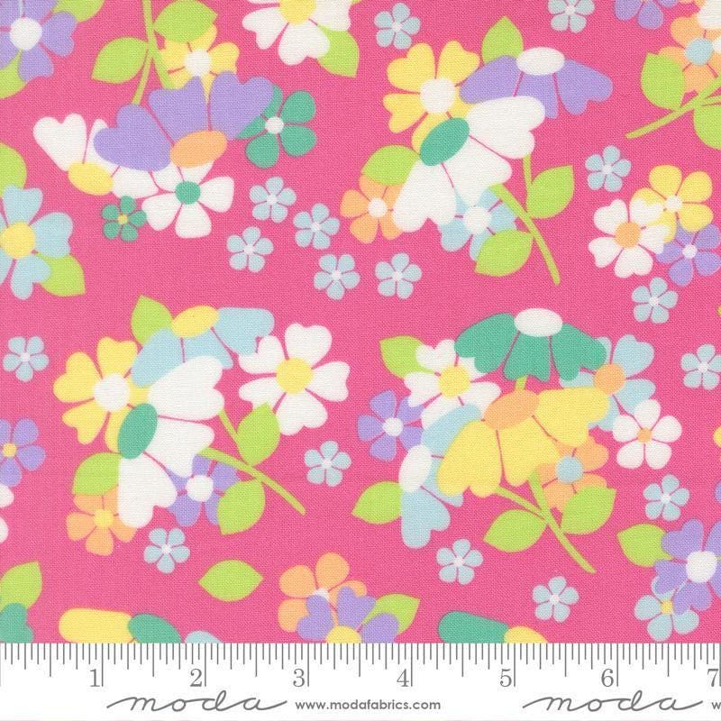 Image of Joysome Flower Fields Petunia quilting cotton fabric by Corey Yoder for Moda Fabrics. Features flowers on a pink background. Cute Little Fabric Shop.