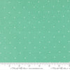 Image of Joysome Tiny Peel Peacock quilting cotton fabric by Corey Yoder for Moda Fabrics. Features tiny xs on a green blue background. Cute Little Fabric Shop.
