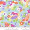Image of Joysome Flower Fields Frost quilting cotton fabric by Corey Yoder for Moda Fabrics. Features flowers on a blue background. Cute Little Fabric Shop.