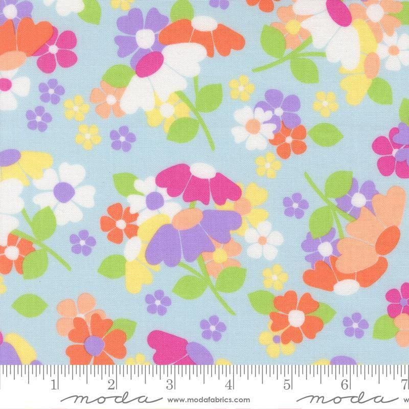 Image of Joysome Flower Fields Frost quilting cotton fabric by Corey Yoder for Moda Fabrics. Features flowers on a blue background. Cute Little Fabric Shop.