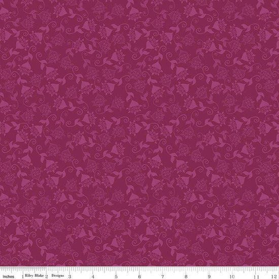 Image of Where the Wild Flowers Area Whimsy Fuchsia quilting cotton fabric by Judi Madsen for Riley Blake Designs. Features flowers on a purple background. Cute Little Fabric Shop.