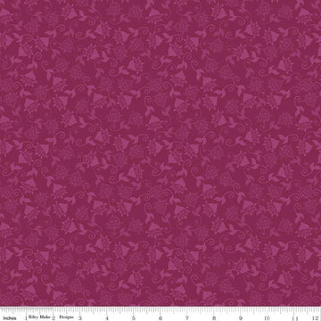 Image of Where the Wild Flowers Area Whimsy Fuchsia quilting cotton fabric by Judi Madsen for Riley Blake Designs. Features flowers on a purple background. Cute Little Fabric Shop.
