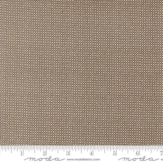 Image of Bug Collector Bug Net Dirt quilting cotton fabric by Sweetwater for Moda Fabrics. Features circles on a brown background. Cute Little Fabric Shop.