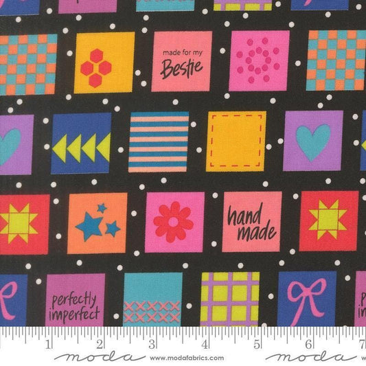 Image of Makers Delight Handmade Labels Super Black by Chrissy Lux for Moda Fabrics. Features squares on a black background. Cute Little Fabric Shop.