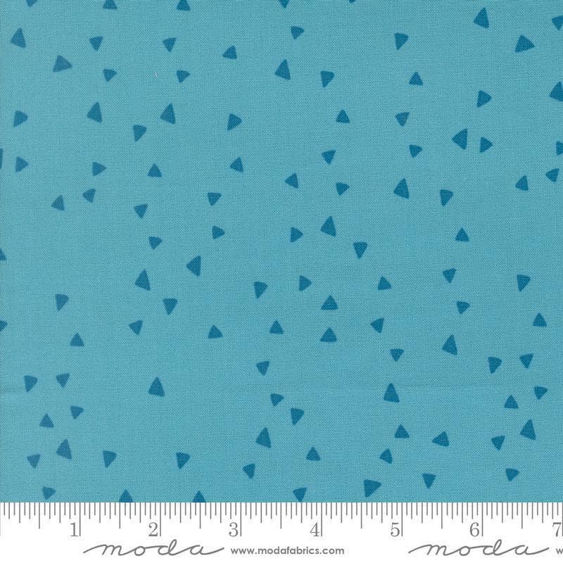 Image of Makers Delight Trimmings Blue Chill by Chrissy Lux for Moda Fabrics. Features triangles on a blue background. Cute Little Fabric Shop.