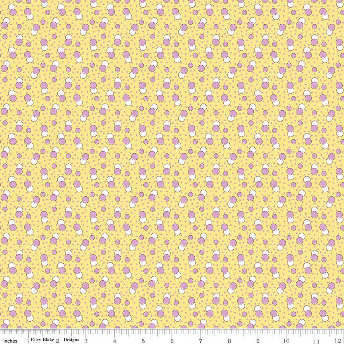 Image of Traditional 30's Dots Yellow quilting cotton fabric by Lindsay Wilkes for Riley Blake Designs. Features polka dots on a yellow background. Cute Little Fabric Shop.