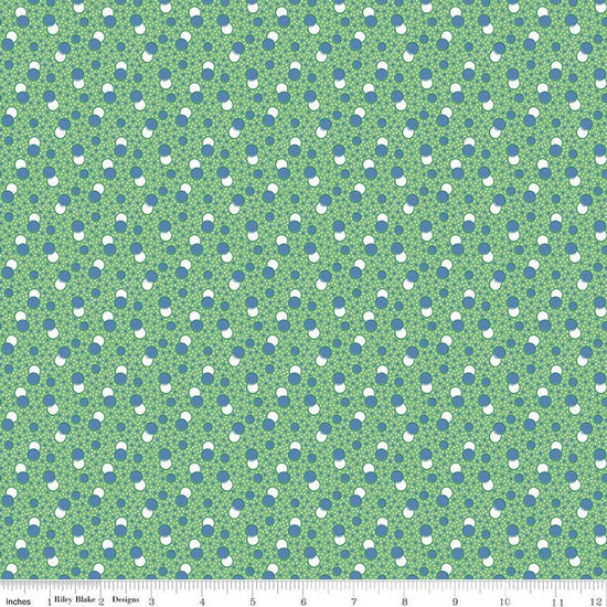 Image of Traditional 30's Dots Green quilting cotton fabric by Lindsay Wilkes for Riley Blake Designs. Features polka dots on a green background. Cute Little Fabric Shop.