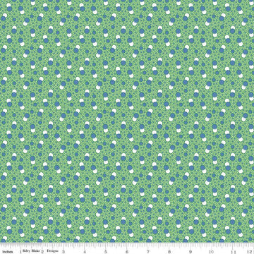 Image of Traditional 30's Dots Green quilting cotton fabric by Lindsay Wilkes for Riley Blake Designs. Features polka dots on a green background. Cute Little Fabric Shop.