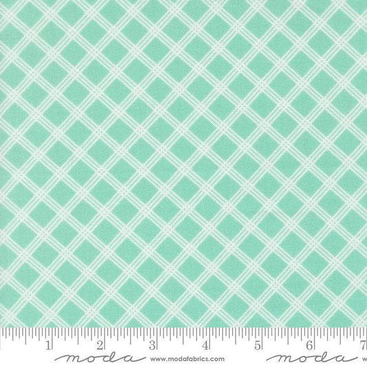 Image of Joysome Charming Check Seaglass quilting cotton fabric by Corey Yoder for Moda Fabrics. Features squares on a blue green background. Cute Little Fabric Shop.