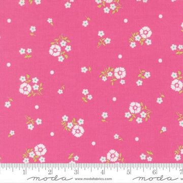 Image of Joysome Hand Picked Petunia quilting cotton fabric by Corey Yoder for Moda Fabrics. Features flowers on a pink background. Cute Little Fabric Shop.