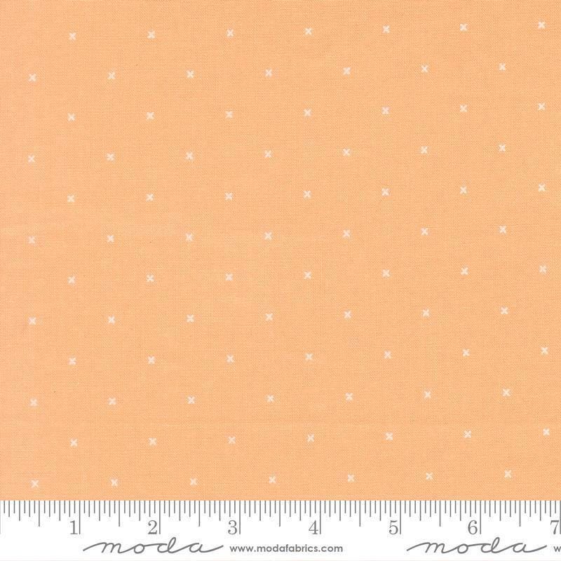Image of Joysome Tiny Peel Cantaloupe quilting cotton fabric by Corey Yoder for Moda Fabrics. Features tiny xs on an orange background. Cute Little Fabric Shop.