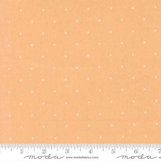 Image of Joysome Tiny Peel Cantaloupe quilting cotton fabric by Corey Yoder for Moda Fabrics. Features tiny xs on an orange background. Cute Little Fabric Shop.