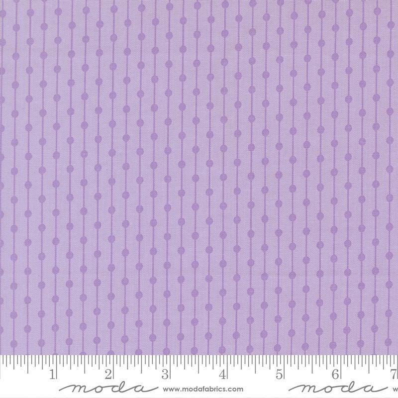 Image of Joysome Jelly Bracelet Wisteria quilting cotton fabric by Corey Yoder for Moda Fabrics. Features stripes and dots on a purple background. Cute Little Fabric Shop.