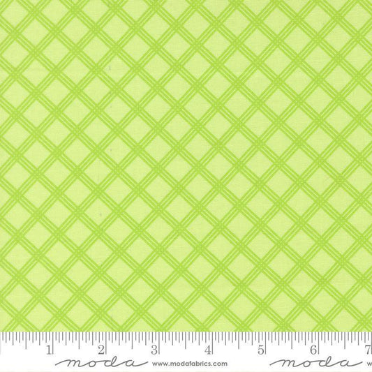 Image of Joysome Charming Check Honeydew quilting cotton fabric by Corey Yoder for Moda Fabrics. Features a geometric pattern on a green background. Cute Little Fabric Shop.