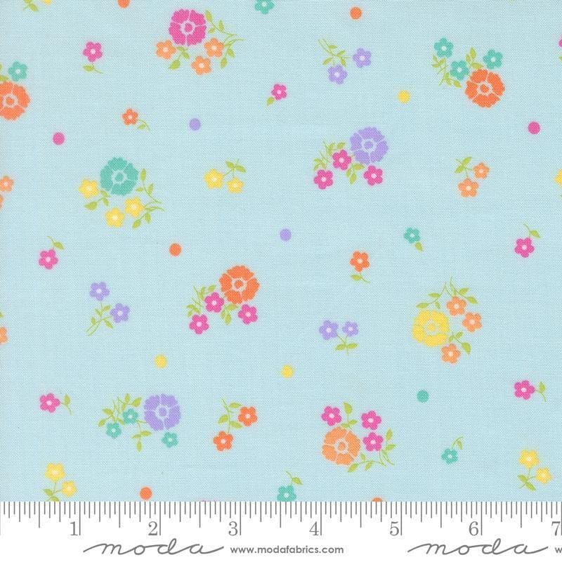 Image of Joysome Hand Picked Frost quilting cotton fabric by Corey Yoder for Moda Fabrics. Features flowers on a blue background. Cute Little Fabric Shop.