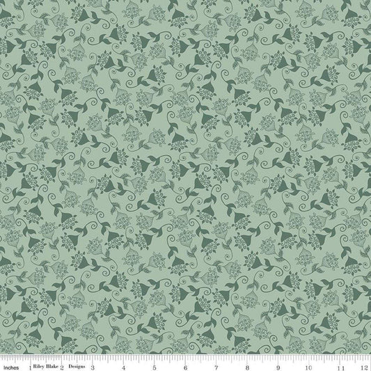 Image of Where the Wild Flowers Area Whimsy Sage quilting cotton fabric by Judi Madsen for Riley Blake Designs. Features flowers on a green background. Cute Little Fabric Shop.