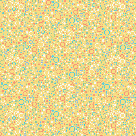 Image of Little Squirt Bubbles Icy Yellow quilting cotton fabric by Morris Creative Group for QT Fabrics. Features circles on a yellow background. Cute Little Fabric Shop.