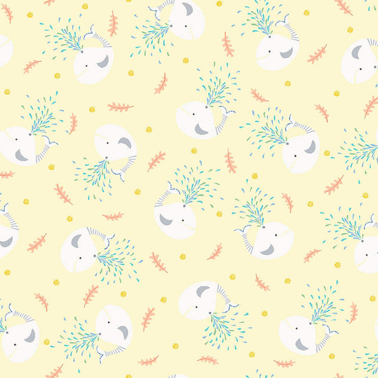 Image of Little Squirt Tossed Whale Pale Yellow quilting cotton fabric by Morris Creative Group for QT Fabrics. Features whales on a yellow background. Cute Little Fabric Shop.