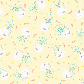 Image of Little Squirt Tossed Whale Pale Yellow quilting cotton fabric by Morris Creative Group for QT Fabrics. Features whales on a yellow background. Cute Little Fabric Shop.