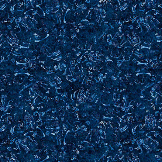 Image of Terrors of the Pleistocene Fossil Bed Navy quilting cotton fabric by Morris Creative Group for QT Fabrics. Features bones on a blue background. Cute Little Fabric Shop.