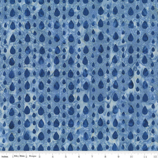 Image of Batiks Around the World London Whispering Moon quilting cotton fabric by Tara Reed for Riley Blake Designs. Features raindrops on a blue background. Cute Little Fabric Shop.