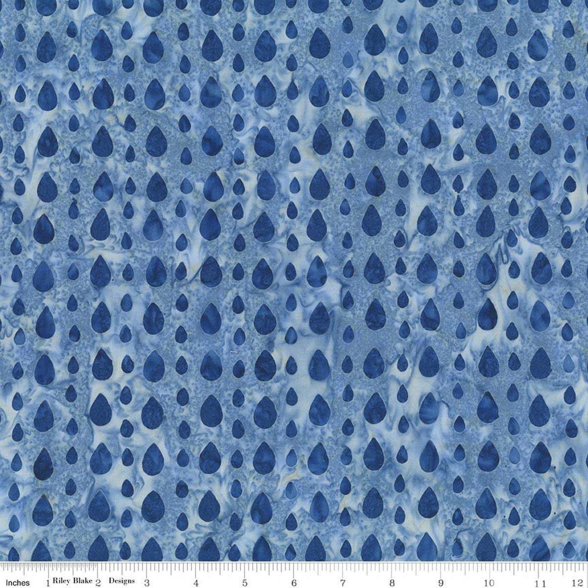 Image of Batiks Around the World London Whispering Moon quilting cotton fabric by Tara Reed for Riley Blake Designs. Features raindrops on a blue background. Cute Little Fabric Shop.