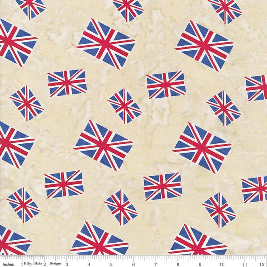 Image of Batiks Around the World London Toasted Almond quilting cotton fabric by Tara Reed for Riley Blake Designs. Features the british flag on a cream background. Cute Little Fabric Shop.
