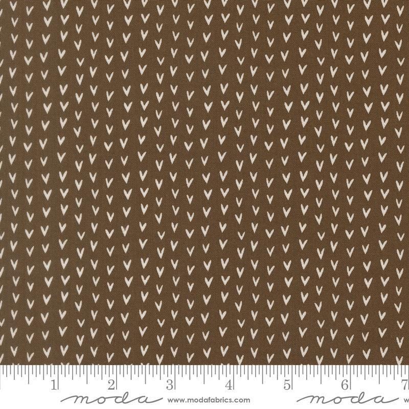 Image of Bug Collector Love Bug Dirt quilting cotton fabric by Sweetwater for Moda Fabrics. Features hearts on a brown background. Cute Little Fabric Shop.