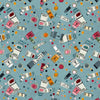 Image of Drawn to Create Paint Tubes Dusty Teal quilting cotton fabric by Eulalia Mejia for QT Fabrics. Features art supplies on a blue background. Cute Little Fabric Shop.