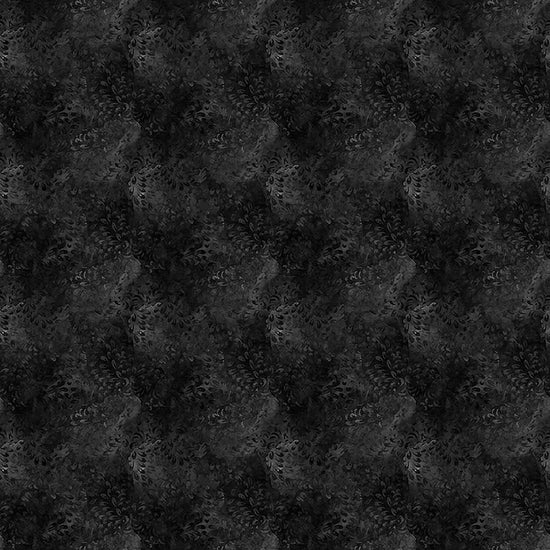 Image of Dreamweaver Blender Charcoal quilting cotton fabric by Morris Creative Group for QT Fabrics. Features an abstract pattern on a black background. Cute Little Fabric Shop.