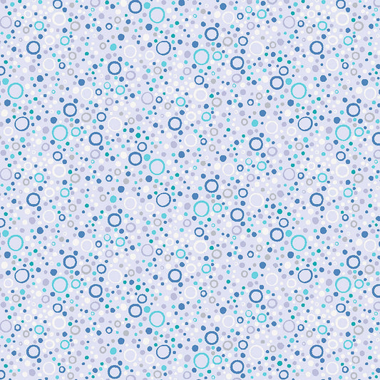 Image of Little Squirt Bubbles Pale Lilac quilting cotton fabric by Morris Creative Group for QT Fabrics. Features circles on a purple background. Cute Little Fabric Shop.