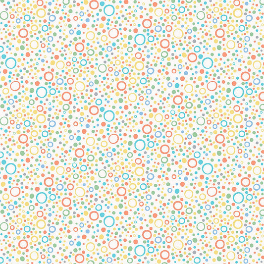 Image of Little Squirt Bubbles Light Cream quilting cotton fabric by Morris Creative Group for QT Fabrics. Features circles on a white background. Cute Little Fabric Shop.